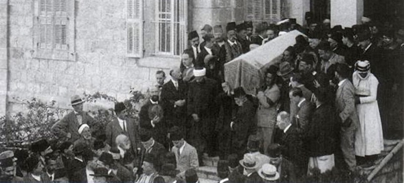People carry coffin