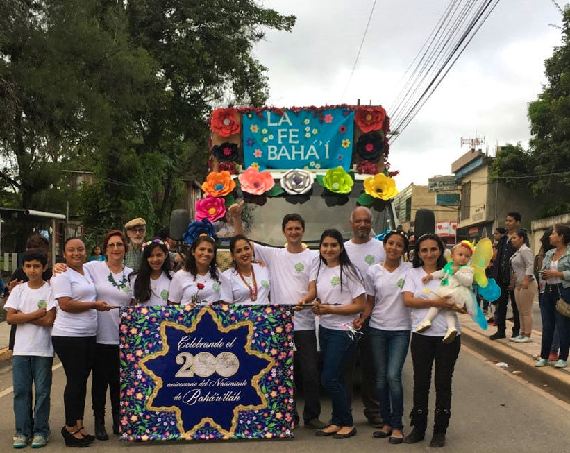 Bahá’ís in Honduras participate in flower parade